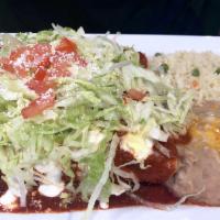 Enchiladas · Green or red. Cheese or chicken. Lettuce, cotija cheese, sour cream and tomato. Served with ...