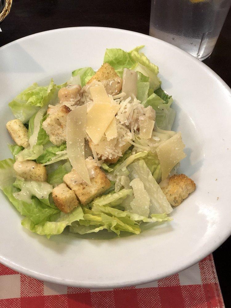 Caesar Salad · Romaine lettuce, Parmesan cheese, garlic croutons, and Caesar dressing.