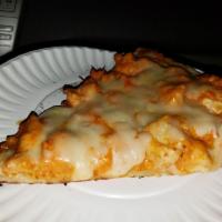 Buffalo Chicken Pizza · Thin crust pizza with spicy sauteed chicken and blue cheese.