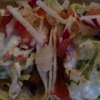Grilled Fish Taco · Two tacos.
