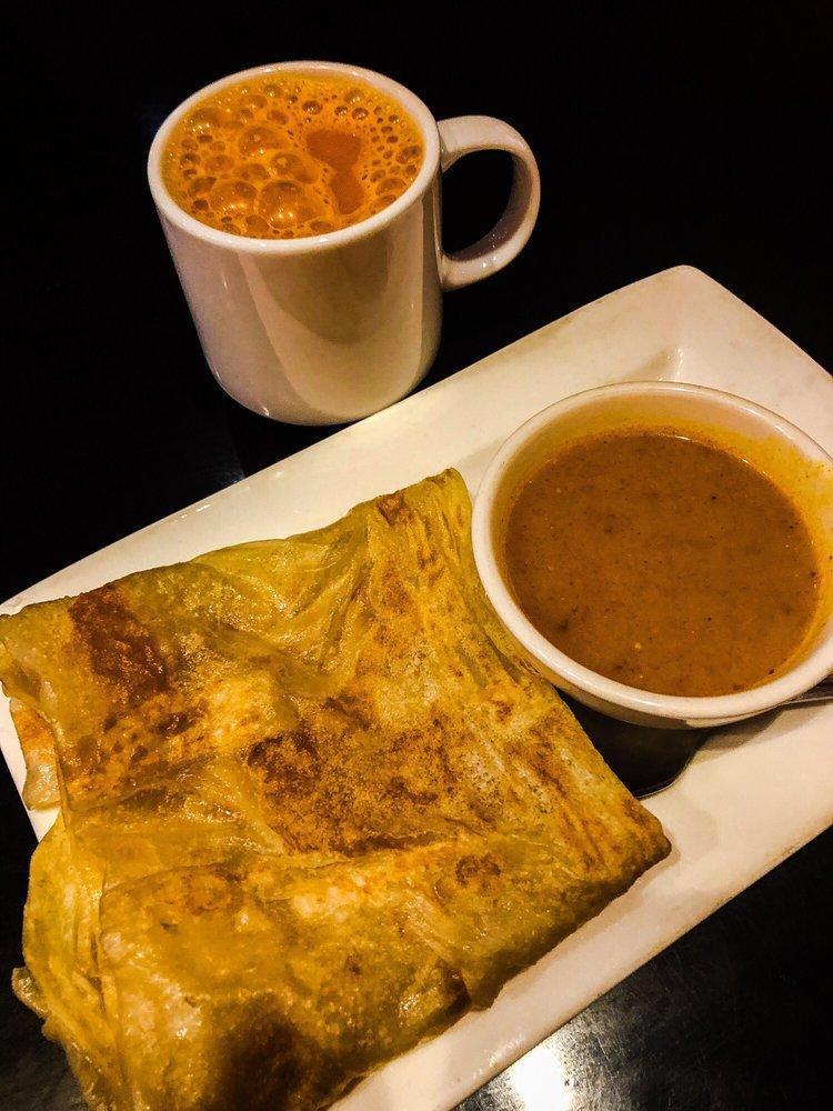 Roti Canai · Indian style pancake. Served with curry potato chicken dipping sauce.
