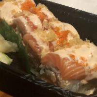Dragon Roll · Eel, cucumber inside wrapped with rice and topped with thin-sliced avocado.
