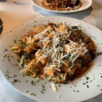 Lasagna · Meat sauce, sausage, ricotta, Asiago, fontina, mozzarella and Gouda.