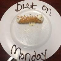 Cannoli · Delicious tube of fried dough, filled with a sweet, creamy ricotta filling.