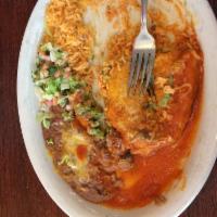 Chile Relleno · A fresh pasilla chile filled with monterey jack cheese, covered with our fluffy egg butter, ...