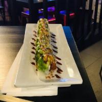 Dragon Roll · Shrimp tempura, cream cheese, spicy mayo, asparagus, avocado. Topped with eel sauce.