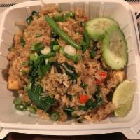 Spicy Basil Fried Rice · Stir fried rice with choice of chicken, beef, pork, or tofu cooked, and egg with basil, grou...