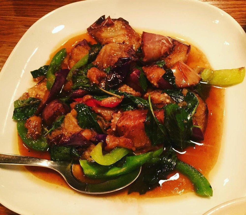 Saute Eggplant Wok · Deep fried eggplant stir fried with your choice of meat, bell peppers, soy bean sauce, white pepper and basil leaves.