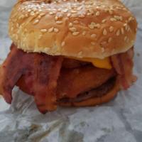 Cowboy Burger · Come with 2 battered onion rings, bbq sauce bacon jalapeno and cheese.