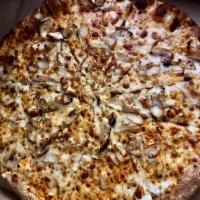 Buffalo Chicken Pizza · White meat chicken drenched with franks red hot sauce and blue cheese on a creamy ranch sauc...
