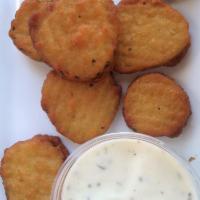 Fried Pickle Chips · Juicy dill pickles dipped in our homemade batter and deep fried served with ranch dressing.