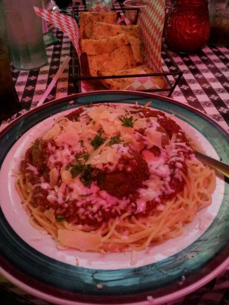 Spaghetti and Meatballs · Fresh spaghetti pasta cooked el dente with our homemade meat sauce and topped with 2 large Italian meatballs, mozzarella and Parmesan cheese.