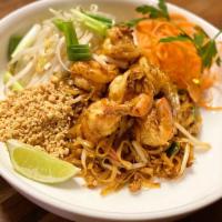 Pad Thai · Sauteed rice noodles with crushed peanut, bean sprouts, scallions and egg in tamarind sauce.