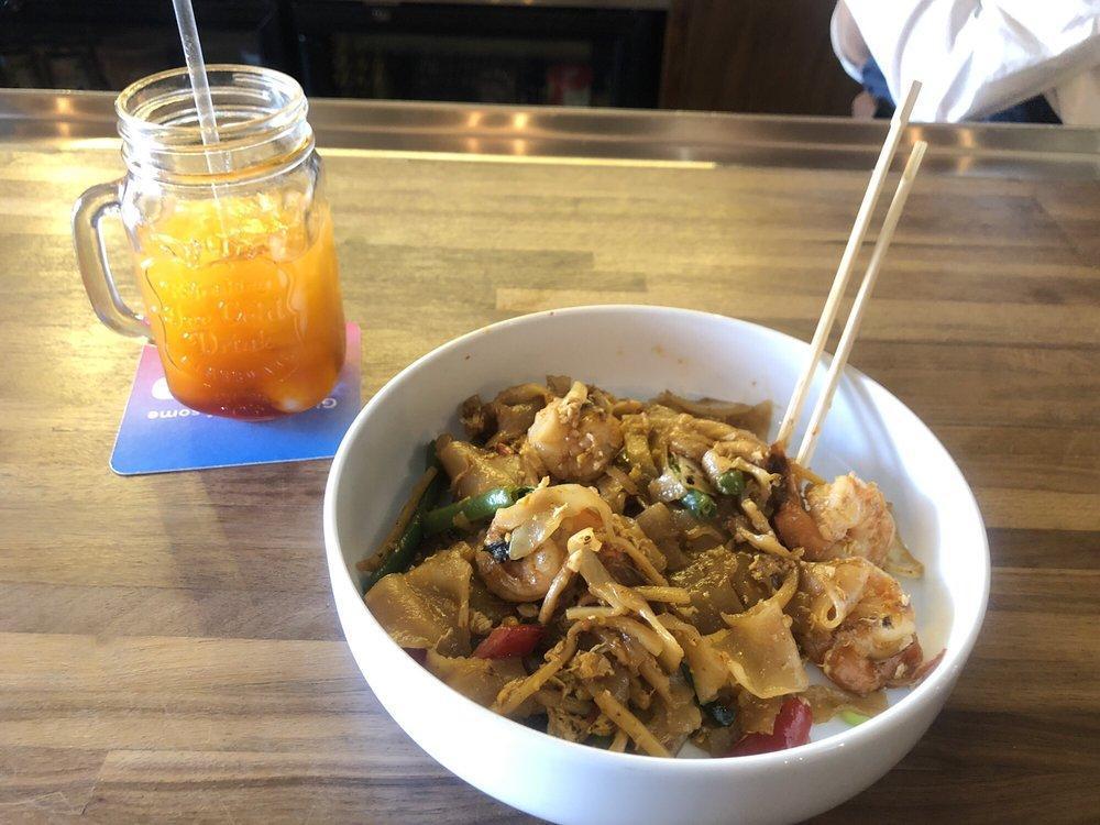 Drunken Noodle · Sauteed flat noodles with egg, basil, onions, carrots, string beans, bamboo shoots and bell peppers in Thai spicy herb soy sauce. Spicy.