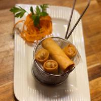 Thai Spring Roll · Fried vegetable rolls stuffed with mix veggie and glass noodle served with sweet chili sauce.