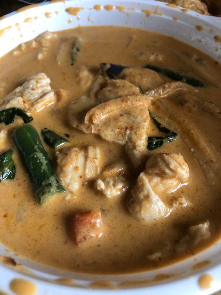 Red Curry · Delicious curry dish with red creamy coconut milk with hot red chili paste, eggplants, bamboo shoots, basil leaves and red bell peppers. Spicy.
