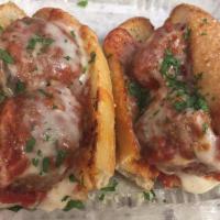 Meatball Sub · Meatballs, tomato sauce and provolone cheese.