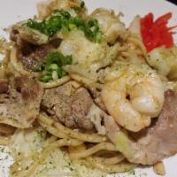 Garlic Yakisoba · Cabbage, shrimp, calamari, crispy garlic, green onion and pork belly. Fried noodles made exc...