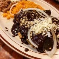 Enchiladas · Three colors, one chicken, one ground beef (picadillo) and one cheese with red sauce, green ...