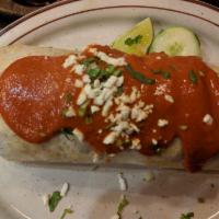 Chile Relleno · 2 poblano peppers stuffed with chicken, cheese, ground beef or chorizo potatoes and topped w...