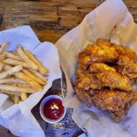 Honey Garlic Wings · -fried wings marinated with honey and garlic sauce, that is sweet, bold and crunchy