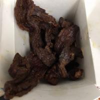 Beef Jerky · Deep-fried marinated beef served with spicy jerky sauce.