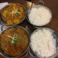 Aloo Gobi · Potato and cauliflower in a spiced sauce. Served with side.