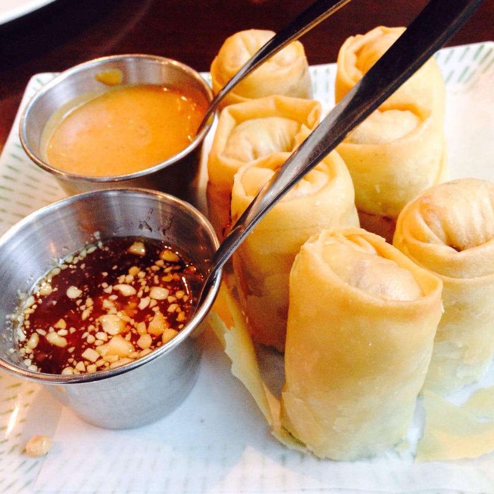 Spring Rolls · Deep fried vegeterian rolls, cabbage, carrot, onion, and Taro served with plum sauce. 