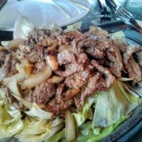 House Special Sizzling Garlic Beef · 