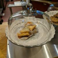 Baklava · Crispy phyllo dough with honey and walnuts.