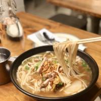 Khao Piak Sen · Rice noodle soup with pork sausages, pork spare ribs, soft pork, pork bloods, scallions and ...