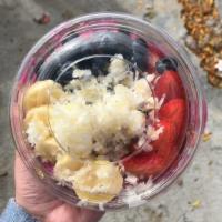 Pitaya Bowl · Dragonfruit, pineapple, strawberry, banana, granola, blueberry, coconut flakes, honey