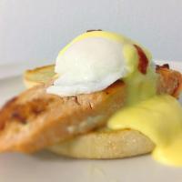 Salmon Egg Benedict · Grilled salmon, over easy poached eggs, English muffin top with bearnaise sauce. Served all ...