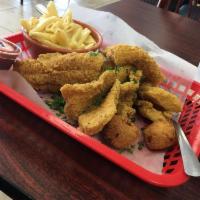 Catfish Basket · 5 hand-battered catfish pieces served with choice of 1 side and 2 hushpuppies.