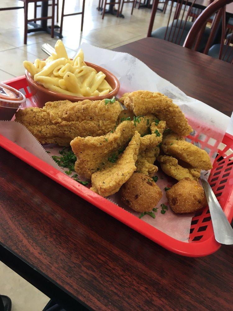 Catfish Basket · 5 hand-battered catfish pieces served with choice of 1 side and 2 hushpuppies.