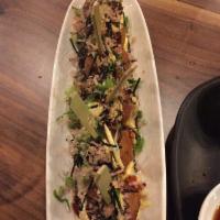Takoyaki · Octopus Ball; Battered octopus over egg tartar topped with kewpie mayonnaise, okonomiyaki sa...