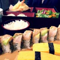 Bonzai Roll · Spicy tuna, tempura green onion, topped with seared albacore, avocado, garlic chips, 7-spice...