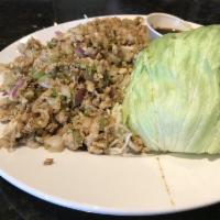 Chicken Lettuce Wrap · Spiced and minced chicken, onion, scallion, water chestnut and mushroom served alongside ref...