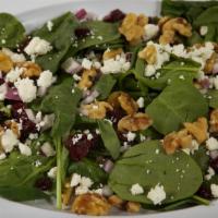 Spinach Salad · Spinach, feta cheese, dried cranberries, red onions and balsamic vinaigrette dressing.