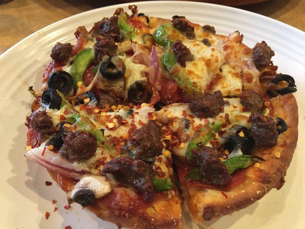 The Chicago Supreme Pizza · Presenting Chicago's 7 Finest: Pepperoni, sausage, mushrooms, onions, green peppers, black olives and extra cheese. 