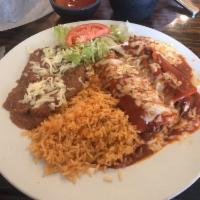 Enchiladas · 2 enchiladas with your choice of beef, chicken or cheese.