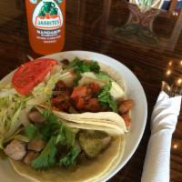 Chili Verde Plate · Sauteed pork with bell peppers and a flour or corn tortilla.