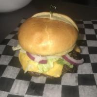 Cheeseburger · Champs seasoned ground beef grilled to perfection with American cheese, lettuce, tomatoes, p...