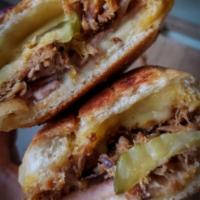 Twisted Cuban Sandwich · Roast pork, ham, pickles, and swiss cheese.