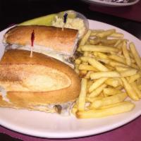 Cheesesteak · Philly or chicken, served with fried onions and cheddar cheese.