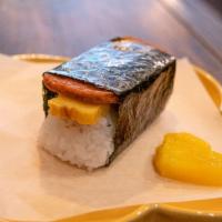 Spam Musubi · Spam, sushi rice, nori, furikake, tamago and soy sauce.