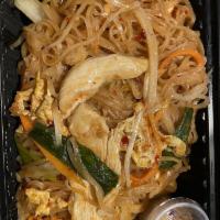 Pad Thai · Stir-fried rice noodles with yellow and green onions, carrots, bean sprouts, fresh basil and...