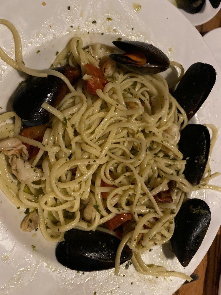 Linguine Tutto Mare · Shrimp, clams, bay scallops, mussels, tomatoes, garlic, butter and parsley.