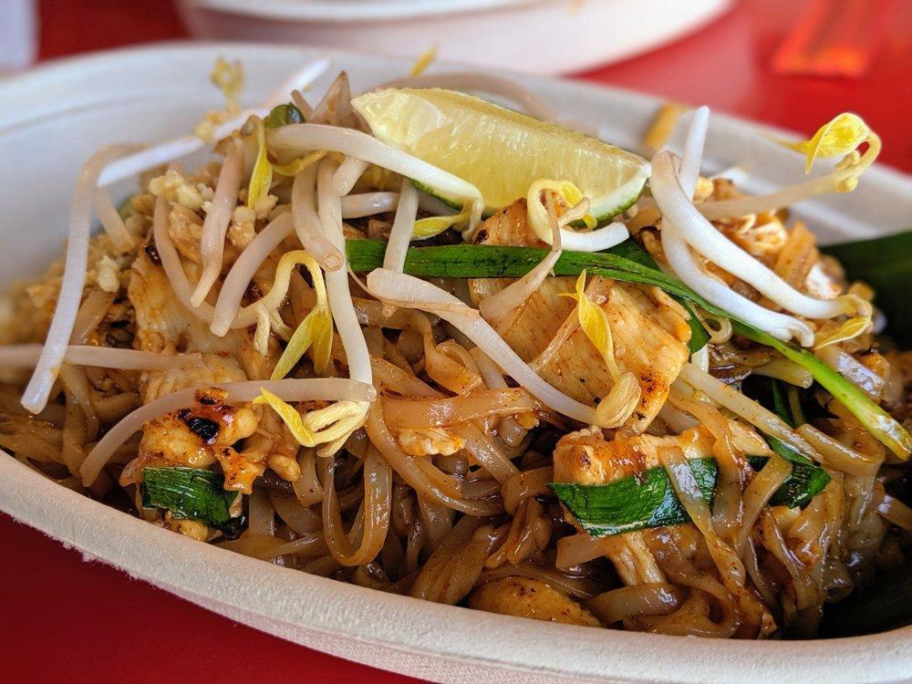 Pad Thai · Thin rice noodle, egg, chives, bean sprout, topped with crushed peanut, fresh bean sprout and lime wedge.
