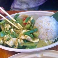 Green Curry · Thai eggplant, bell, green bean, bamboo, Thai basil leaves, milk and coconut milk, served wi...